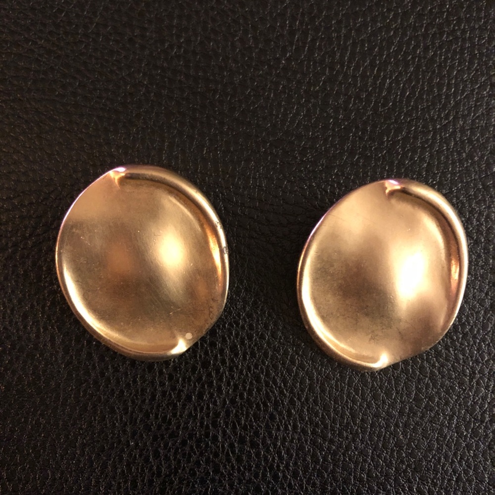 Gold tone disk clip on earrings